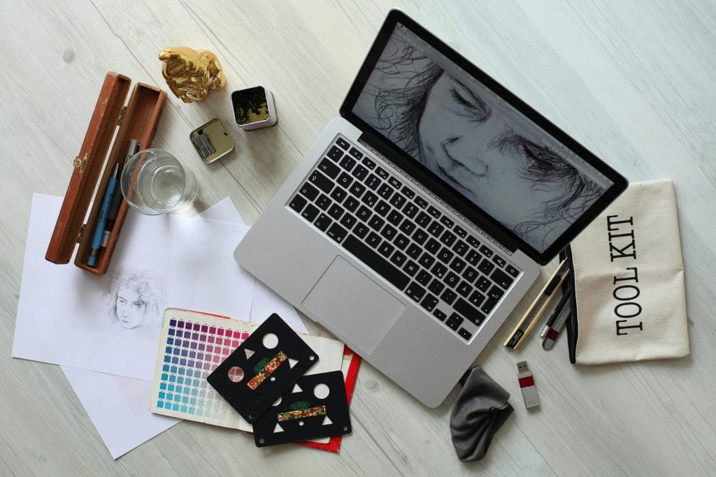 Laptop, pencil and eraser for a artist